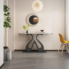 Artistic Marble Console Table with Black Sculptural Base and Silver Ball